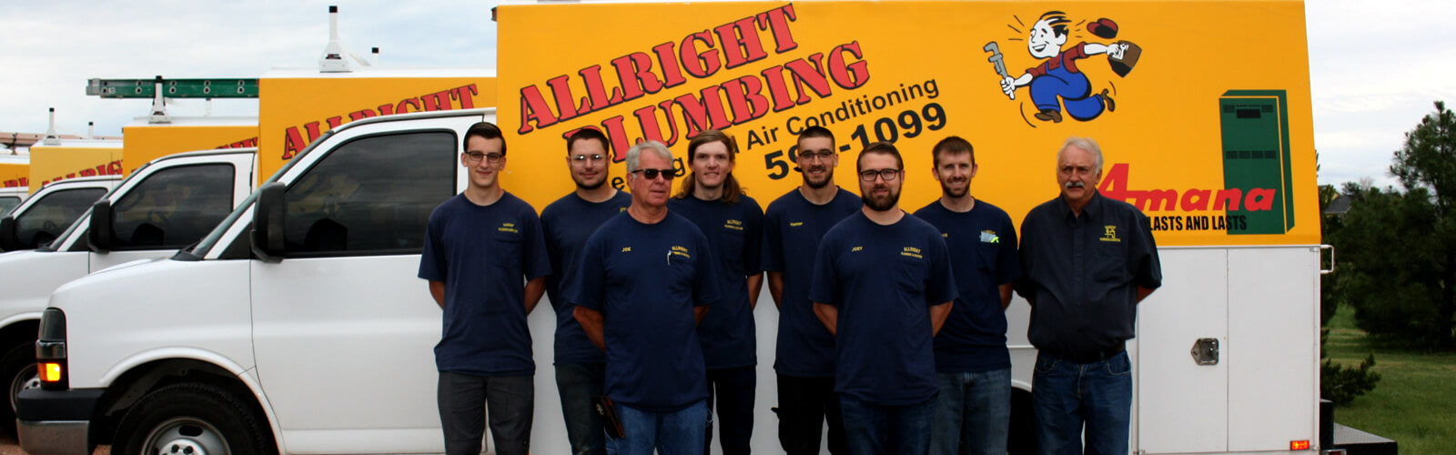 Allright Plumbing & Heating Technicians standing in front of company truck